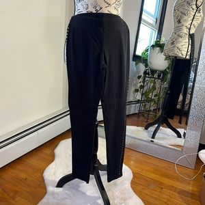 Leggings from Express with studs on the side of each leg.95% cotton 5% spandex